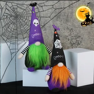 Halloween faceless gnomes with spider web and bat patterns on decorative white blocks