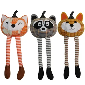 Three plush pumpkin animals with long striped legs for Thanksgiving home decoration