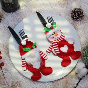 Christmas silverware holders set with Santa and Snowman designs for holiday table decor