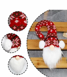 Detail of Christmas gnome hanger with red knitted hat and white beard decoration