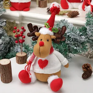 Plush Christmas reindeer doll in white knit sweater with red heart and festive pointed hat