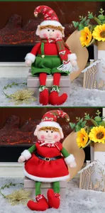 Detail of Christmas elf plush dolls featuring knit hats with bells and festive attire