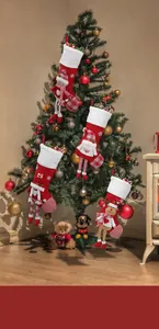 Detail of four 3D Christmas stockings featuring snowman, elf, reindeer, and bear motifs