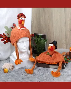 Close-up of Thanksgiving turkey knit hat with autumn decorations and plush textures