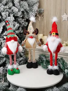 Detailed view of three faceless Christmas gnomes with reindeer antlers and sequined hats