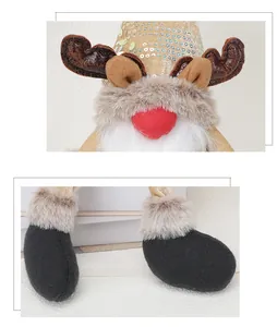Detailed view of sequined gold hat, brown reindeer antlers and plush beard texture
