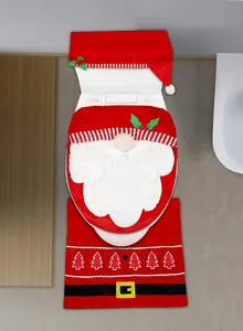 Detail of red Christmas gnome toilet seat cover set with plush beard and belt patterns