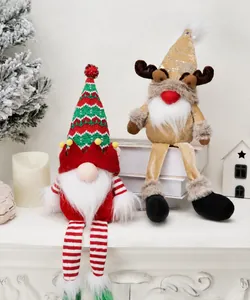 Detail of Christmas gnomes plush set with striped legs and reindeer antlers home decor