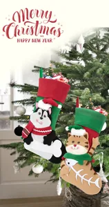 Close-up of plush Christmas stockings featuring festive cat and husky dog patterns