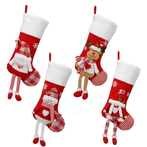 Set of four plush Christmas stockings with Santa, Snowman, Reindeer, and Girl characters
