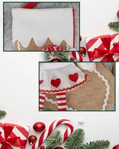 Detail of Christmas stocking featuring white faux fur and brown waffle knit fabric