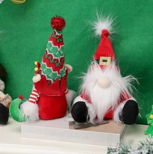 Detail of Christmas gnomes plush set with knitted hats and white faux fur beards
