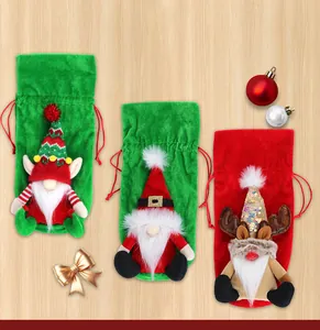 Close-up of plush Christmas wine bottle covers with Santa, elk, and elf holiday designs