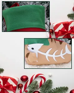 Detail of green Christmas pet stocking with white fishbone applique and precision stitching