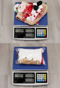 Measurement of Christmas chef doll weight on scale showing approximately 120 grams
