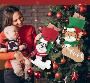 Christmas stockings with cartoon dog and cat patterns hanging in a cozy holiday home scene