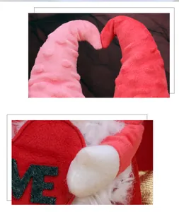 Detail of plush Valentine gnome with love heart heart and soft fabric texture