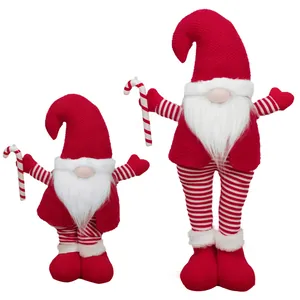 Set of two Nordic Christmas gnomes with telescopic legs and candy cane holiday decorations