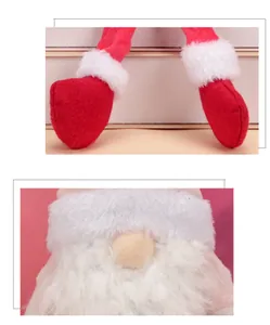 Detailaufnahme einer Wichtelpuppe mit weißem Bart und roten Stiefeln aus Filzstoff