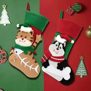 Christmas stockings featuring cartoon cat and dog designs with festive red and green colors