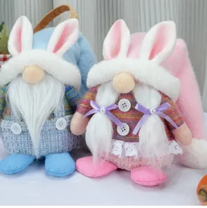 Detail view of handmade Easter gnomes with plush rabbit ears and festive knit textures