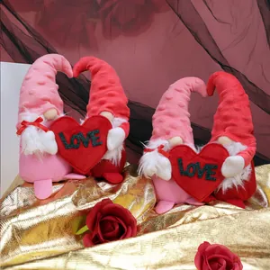 Valentine gnome plush holding a red heart with LOVE text on a black rose background