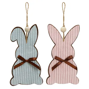 Easter bunny wooden bead ornaments in pink and blue corduroy with rustic twine loops