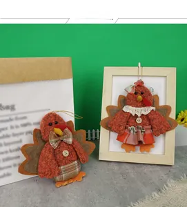 Close-up of handmade fabric Thanksgiving turkey ornaments with plaid and lace details