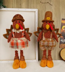 Close-up of standing Thanksgiving turkey dolls with telescopic legs and plush texture