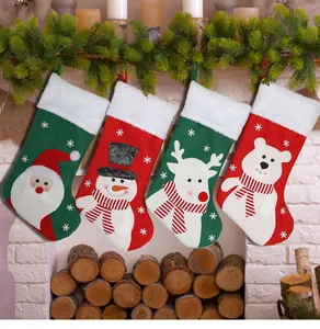 Set of four plush Christmas stockings with Santa, Snowman, Reindeer, and Polar Bear motifs