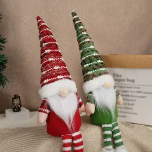Pair of Christmas gnomes with long knitted hats and plush white beards for home decor
