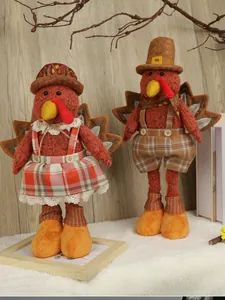 Detail of standing plush turkey figurines in red plaid outfits for Thanksgiving decor