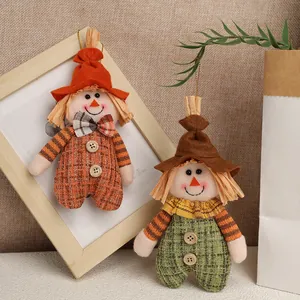 Charming scarecrow hanging ornaments in festive orange and green for Thanksgiving decor