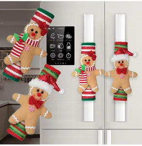 Detail of plush gingerbread man refrigerator handle covers with festive scarves and buttons