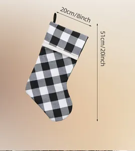 Detailed dimensions of black and white buffalo check Christmas stocking with hanging loop