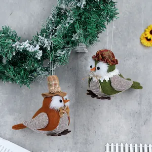 Handmade owl and bird hanging ornaments with plaid fabric wings for festive party decor