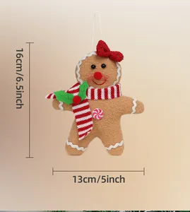 Detailed size view of gingerbread man plush ornament with dimensions 16cm by 13cm