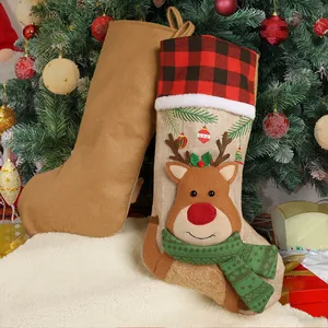 Christmas stockings set with brown fabric and reindeer applique on white plush background