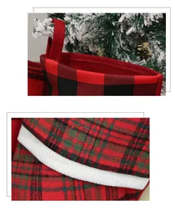 Close-up of classic buffalo plaid Christmas stockings with white velvet cuffs and hooks