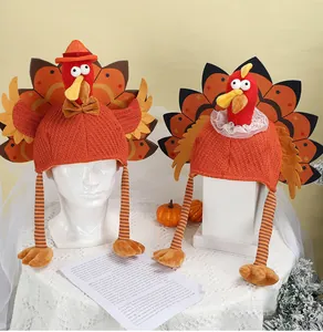 Detail view of knitted Thanksgiving turkey hats with long legs and colorful tail feathers