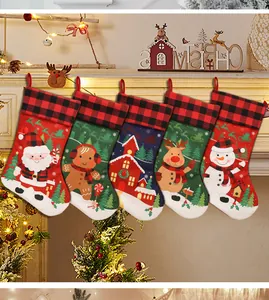 Detailed set of 5 buffalo plaid Christmas stockings with Santa and reindeer on fireplace
