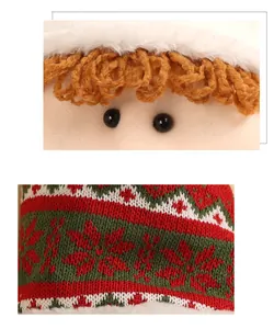 Close-up of knit snowflake patterns and white faux fur trim on a plush Christmas elf doll