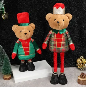 Detail of plush Christmas soldier bears with telescopic legs and festive home decor