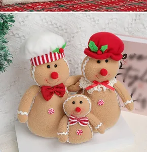 Set de tres peluches de hombre de jengibre con gorros y decoraciones de Navidad