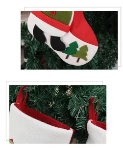 Detail of Christmas stocking featuring fabric tree applique and sturdy hanging loop