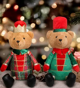 Detail of plush nutcracker soldier bears in red and green festive holiday uniforms