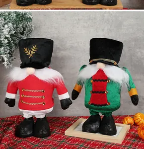 Detail of Christmas gnomes with nutcracker design, velvet uniforms and gold accents