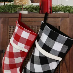 Classic red and black buffalo plaid Christmas stockings set with soft white rib cuffs