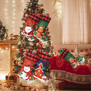 Set of 5 Christmas stockings with buffalo plaid cuffs featuring Santa and reindeer