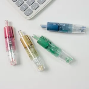 Set of four colorful retractable pen-style dot glue tapes with 5mx6mm clear refills